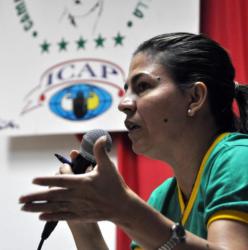 Intervención de Kenia Serrano, presidenta del Instituto Cubano de Amistad con los Pueblos (ICAP), durante un encuentro de los familiares de los Cinco Héroes, con la XX Brigada Latinoamericana y Caribeña de Solidaridad con Cuba, en el campamento internacional Julio Antonio Mella, en Caimito, provincia de Artemisa