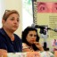 Elizabeth Palmeiro (I), esposa de Ramón Labañino, y Adriana Pérez O'Connor (C), esposa de Gerardo Hernández Nordelo, uno de Los Cinco Héroes antiterroristas cubanos condenados injustamente en los Estados Unidos; interviene durante un encuentro con estudiantes de diferentes niveles de enseñanza y amigos solidarios con Cuba