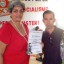 Isbel Guilarte Reyes secretaria de la CTC en Guantánamo reconoce al investigador del Centro de Desarrollo de la Montaña y delegado al XX Congreso Loexis Rodríguez Montoya. Foto: Rodny Alcolea