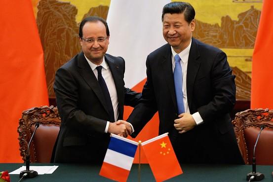François Hollande y Xi Jinping durante la visita del mandatario chino a París en marzo del 2014