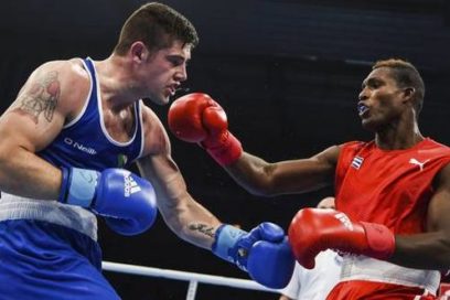 Mundial de Boxeo: Cinco sonrisas y una mueca en el rostro