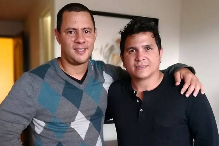 Israel Rojas y Yoel Martínez, integrantes del Grupo Buena Fe