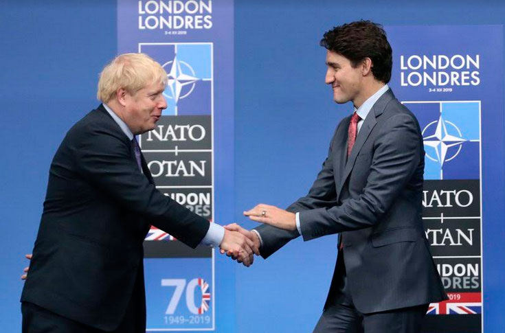 En el 2019, el primer ministro británico Boris Johnson, izquierda, recibió a su homólogo canadiense Justin Trudeau. Foto: AP//TEXCOCO PHOTO