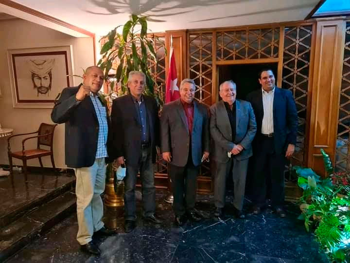 Ismael Drullet, George Mavrikos y Ulises Guilarte, junto a diplomáticos cubanos en España. Foto: Tomada de las redes sociales de Ismael Drullet
