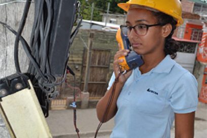 A Young Woman Joins the Ranks of Etecsa Repairmen